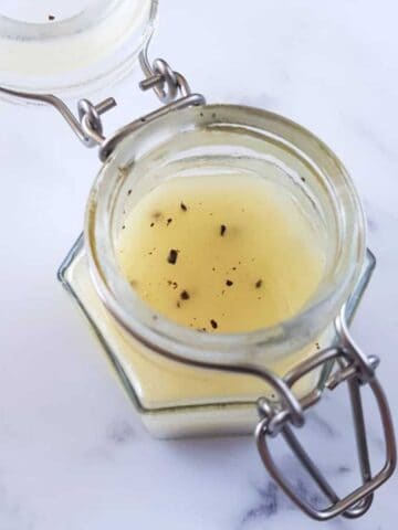 Lemon pepper salad dressing in a jar.