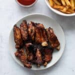 Air fryer ribs on a plate.